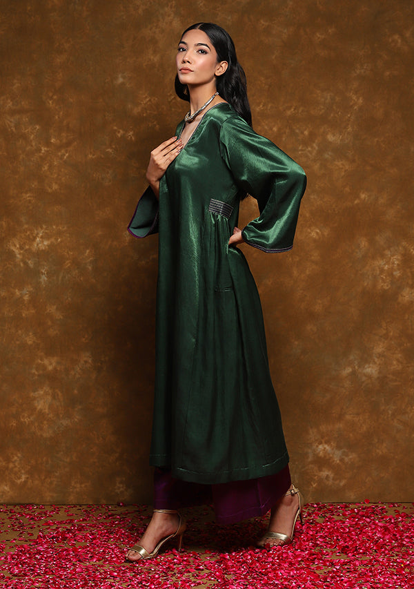 Green Mushru Kurta with Gold Trimmings Paired with Purple Pants