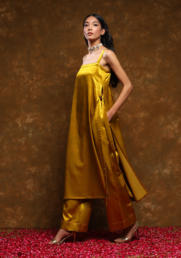 Mustard Strappy Long Mushru Kurta with Tie Up Detail paired with Straight Pants