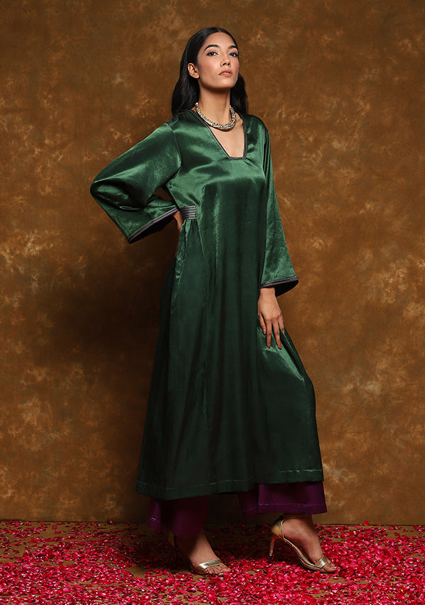 Green Mushru Kurta with Gold Trimmings Paired with Purple Pants