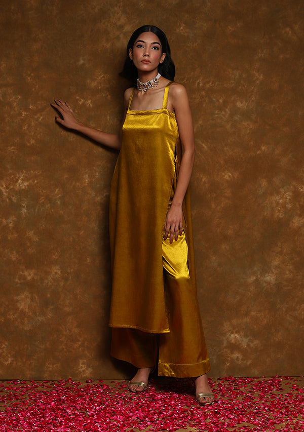 Mustard Strappy Long Mushru Kurta with Tie Up Detail paired with Straight Pants