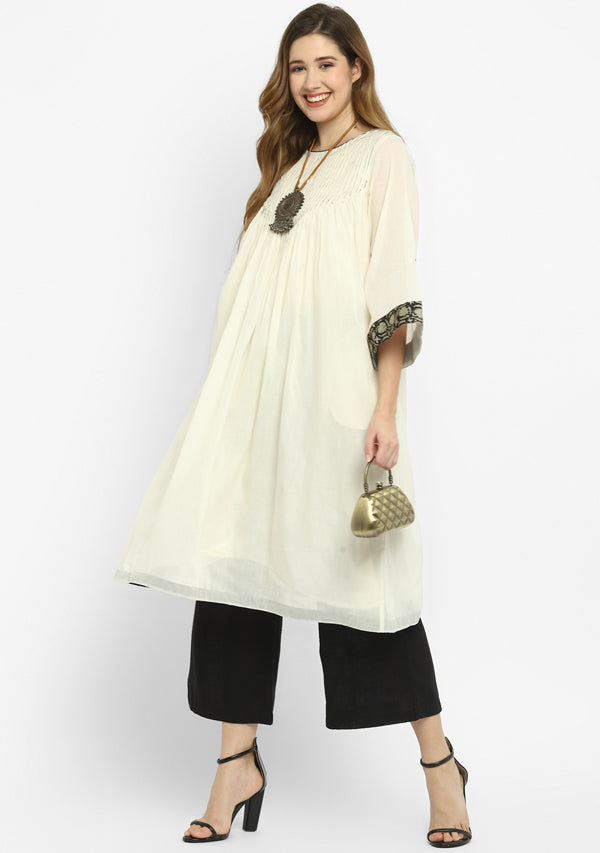 Ivory Mulmul A-Line Kurta Dress With Black Pintucks Paired with Cotton Pants/Slip